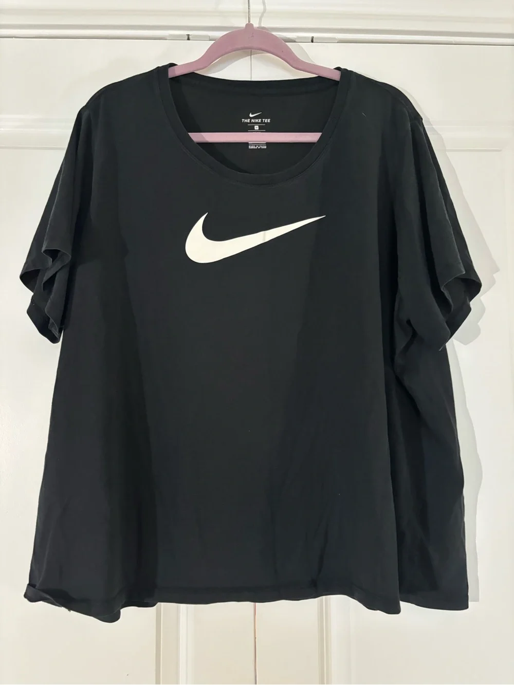 Nike Black Short-Sleeve Tee with White Swoosh - Picture 1 of 3